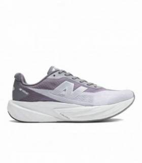 New Balance FuelCell Rebel v5 Hombre Magnet Light Zinc Blue vista lateral exterior
